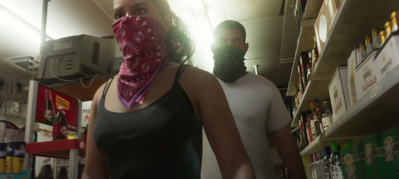 Inside a store, two people masked up.