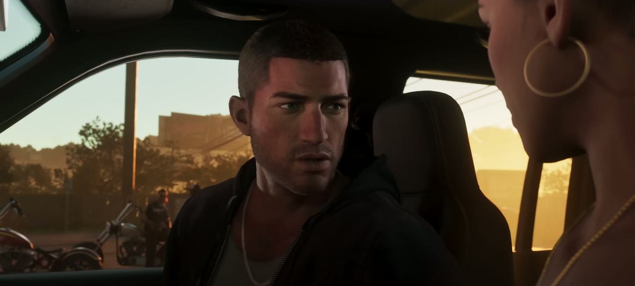 Jason at the wheel with a passenger, low sun.
