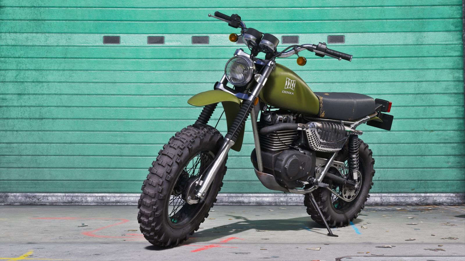 A green and black off road motorcycle parked in front of a green garage door